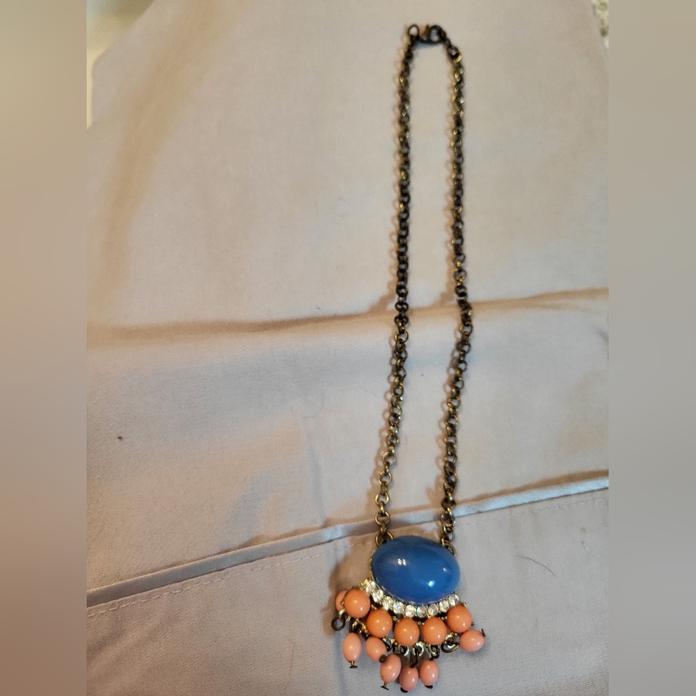 Gold chain necklace with funky pendant